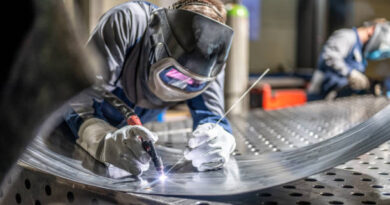 What are the basic processes in the sheet metal manufacturing industry?